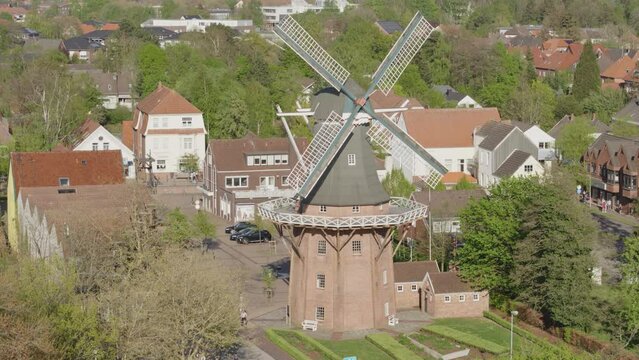 Historical windmill in north germany in Papenburg during a sunny spring day