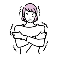 寒気で震えている若い女性
