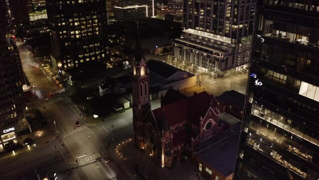 Aerial view of a church at night in the downtown district of Dallas, Texas.