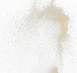 Sand flying explosion, Golden sand wave explode. Abstract sands cloud fly. Yellow colored sand splash throwing in Air. black background Isolated high speed shutter, throwing freeze stop motion