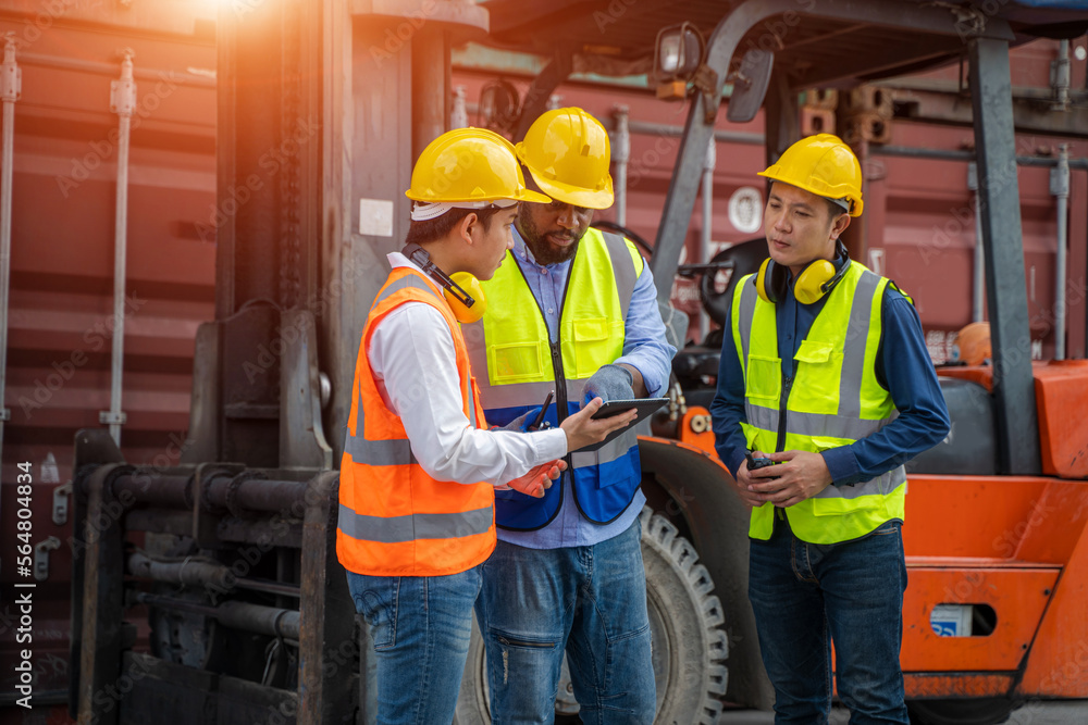 Poster Engineer and worker checking containers data for export and import,Container loading Cargo freight ship.
