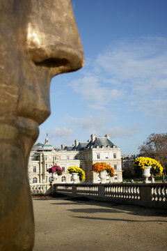 A face overlooks the Luxembourg Gardens during a late autumn afternoon in Paris, France
