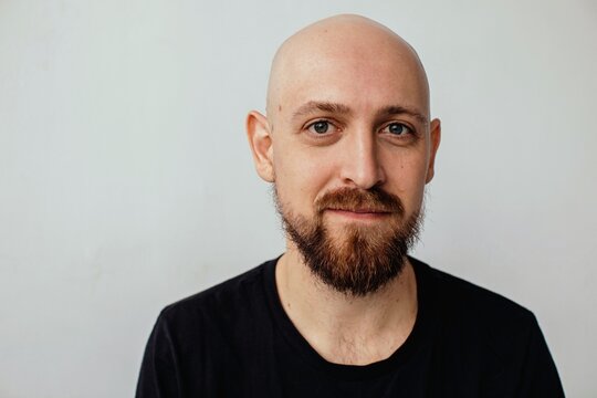 Smiling Bald Man Studio Portrait 