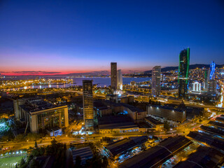 Night general drone view of İzmir Bayraklı residences and the city