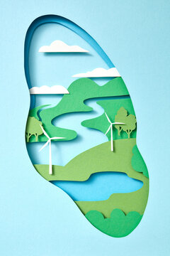 Lung with green landscape in paper cut style.