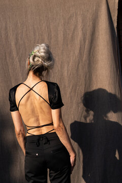back view of Mature grey hair model portrait