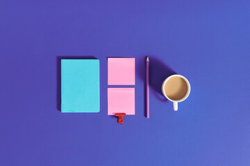 Modern office desk table with notebook and coffee