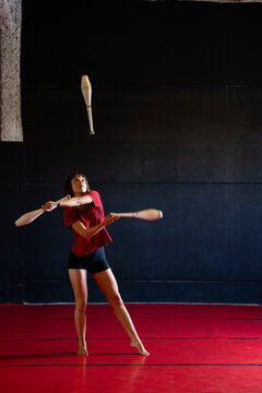 Young female juggler