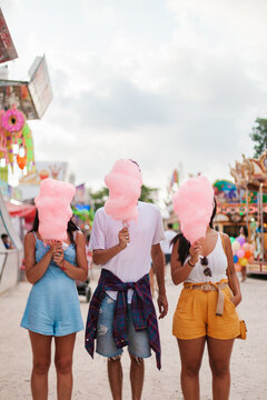 Anonymous Friends Eating Candyfloss At The Fair