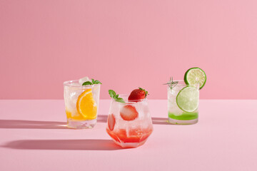 Mojito cocktail with ice cubes. Glass of Summer lemonade or ice tea.