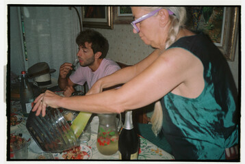 Family lunchtime at home serving fresh food