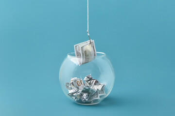 Dollar on hook pulled out of aquarium.