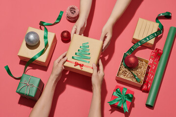 Woman hands holding gift box, preparing surprise for holiday