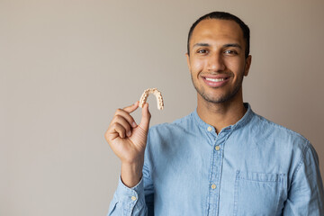 portrait of a man with a 3d shape of teeth
