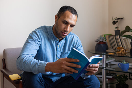 Portrait Of A Guy Reading A Book