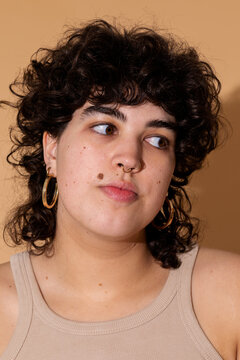 Curly haired  woman indoor portrait