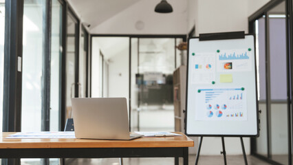 Rear view of Laptop mockup on work desk. Office desk, business composition.