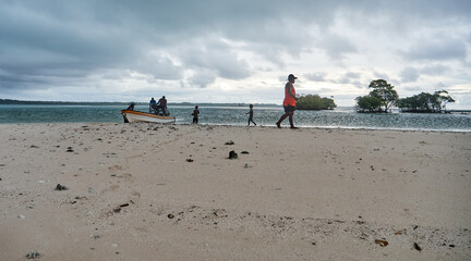 Fototapeta premium Atoll island destroyed by rising sea level change: climate refugees