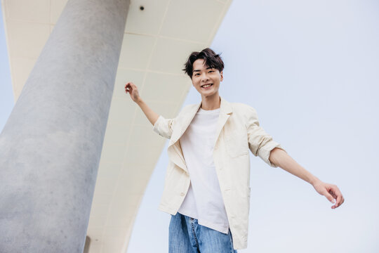 Portrait of  fashion Asian man posing