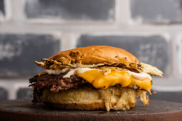 Smash - Beef burger sandwich with parmesan cheese crust, cream cheese and mozzarella cheese
