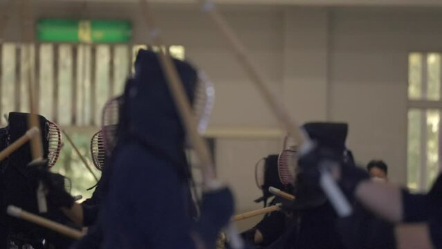 This video shows traditional kendo fighters attacking one another in a kendo class.