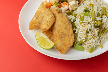 Meal - Fish fillet, rice with broccoli, beans, vegetables in butter and salad