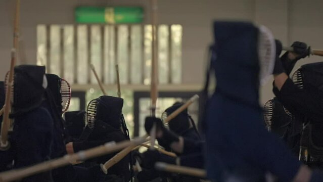 This video shows Japanese kendo fighting matches in slow motion action.