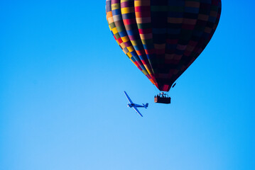 hot air balloon with aeroplane 