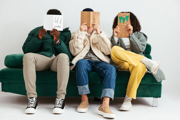 Diverse friends reading greeting cards