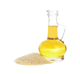 Glass jug of fresh sesame oil and seeds isolated on white