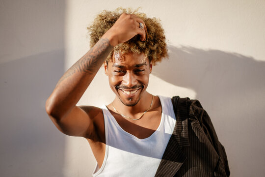 Smiling afro man looking at the camera