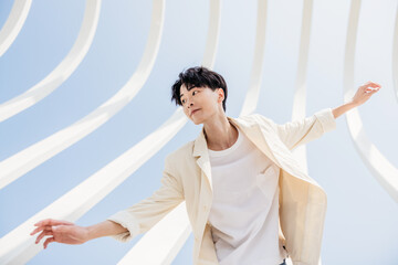 Portrait of  fashion Asian man posing