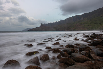 Landscape of Puamau Bay in Hiva Oa, Marquesas Islands, French Polynesia. Sea side with rocks and mountains.