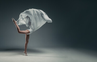 young ballerina girl on a white background