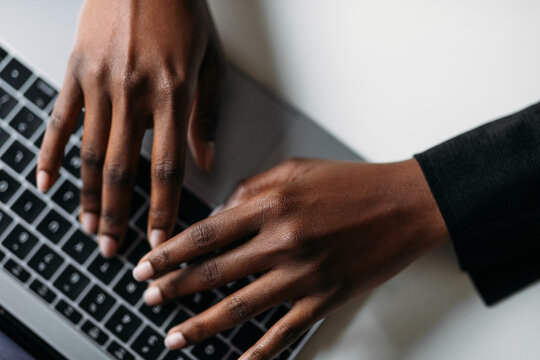 Woman Typing on Laptop Keyboard 