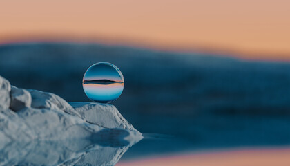 rendered landscape with glass sphere