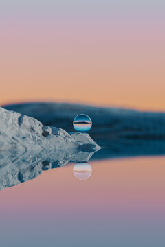 rendered landscape with glass sphere