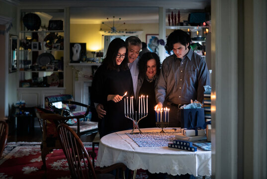 Hanukkah: Family Gathers To Light Two Menorahs