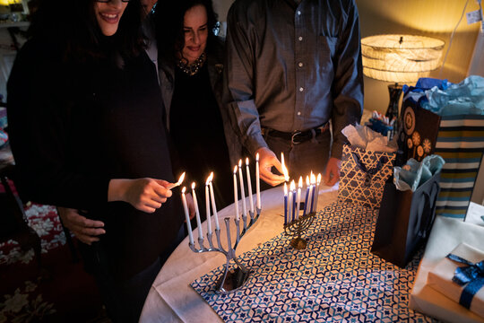 Hanukkah: Family Gathers To Light Two Menorahs