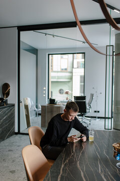 A worker has a break at the kitchen office