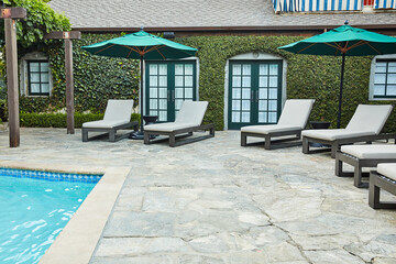 Lounge chairs by pool