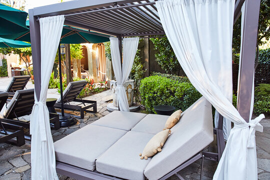 Cabanas on lounge area with champagne at luxury hotel