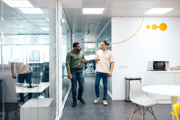 Coworkers chatting in the office