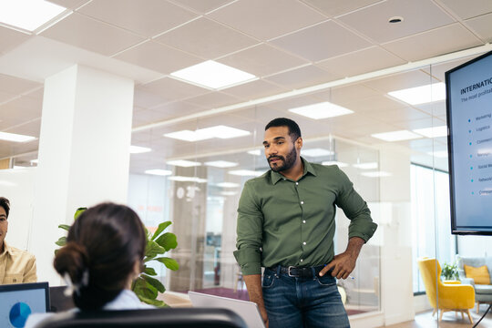 Businessman in an office meeting with his co-workers