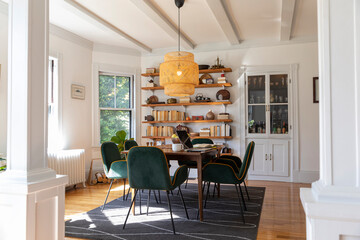 Dining room table with style in contemporary home with laptop computer