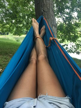 Cropped Image of Woman's Legs in Hammock