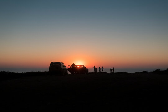 4x4 family excursion on the cliff at sunset