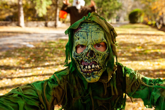 Zombie kid taking selfies on Halloween