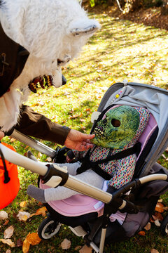 father and baby on stroller