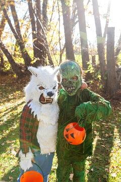 kids with halloween costumes at park